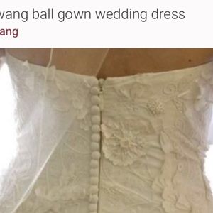 Vera Wang wedding gown. Fitted top, tulle skirt.